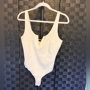 Lulus White V Notch Bodysuit Size L
NWT